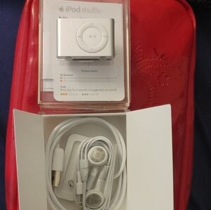 Apple iPod Shuffle-Silver with Earphones. Never Used, No Downloads, Still Attach